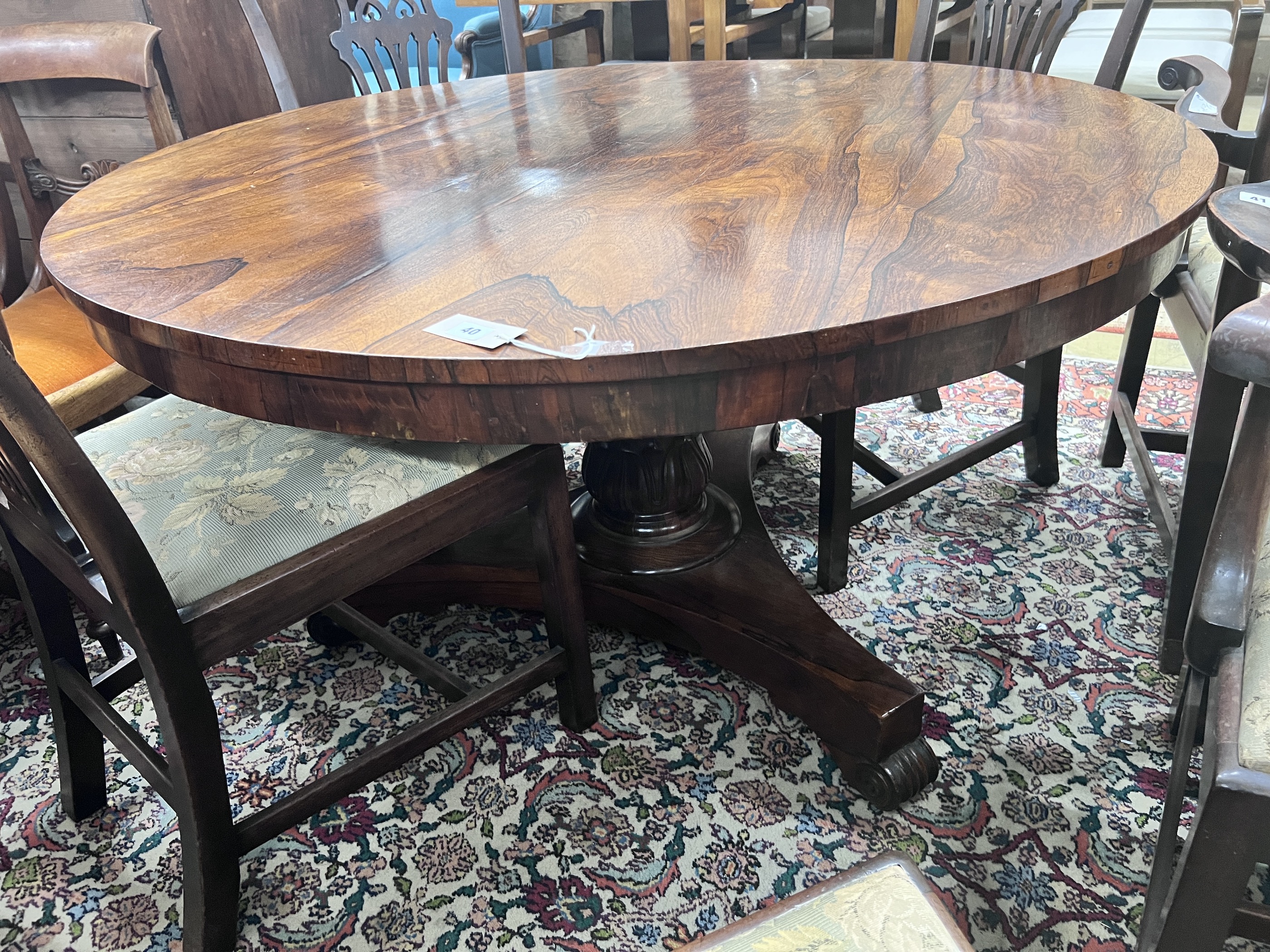 A William IV circular rosewood tilt top breakfast table, diameter 127cm, height 70cm